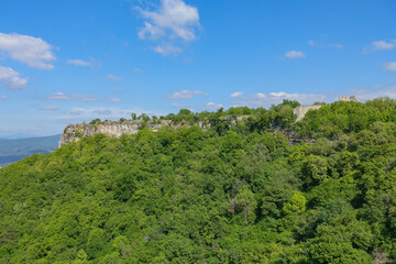 Mangup-Kale cave city, sunny day. Mountain view from the ancient cave town of Mangup-Kale in the Republic of Crimea, Russia. Bakhchisarai.