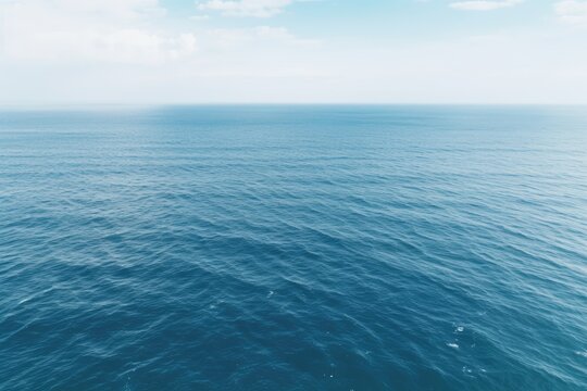 Empty Ocean view from above. Sea surface aerial view. Water surface background.