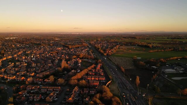 Generic aerial view of the town of Haydock in England with a dual carriageway at dusk