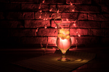 colorful cocktail in glass on dark background or Glasses of cocktails on bar background.Party club...