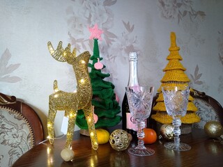 Merry Happy Christmas, New Year's Eve, festive table with Christmas trees