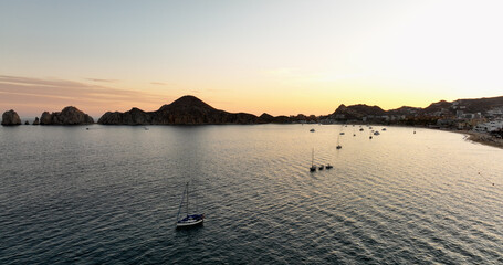 Epic Aerial Cityscape of Cabo San Lucas Baja Mexico City at Sunrise Golden Yellow Sky