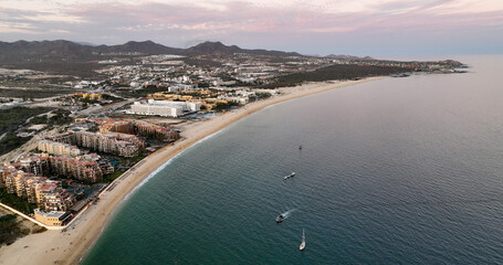 Golden Morning in Cabo Drone Flight Over Beach Resorts