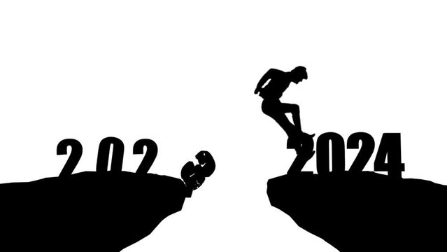 Silhouette man jumping on cliff 2024 over the precipice with stones. New Year's concept. 2023 falls into the abyss. Welcome 2024. People enters the year 2024, creative idea.