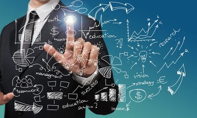 Hand of businessman with a visual graphic screen element.