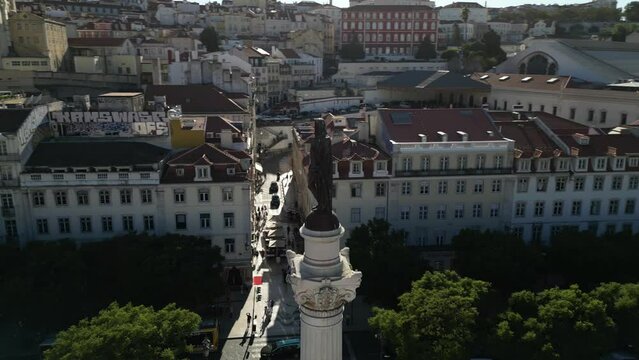 Orbit around the Column of Pedro in Rossio Square of Lisbon, Portugal