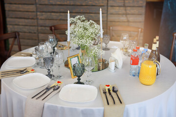 decorated service on a table in a restaurant at a banquet