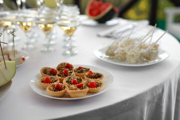 delicious snacks on the festive table at the event