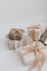 Christmas, New Year composition. Winter holidays gift boxes with bows and ribbons. Festive packaging concept