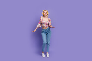 Full length photo of cheerful nice person have good mood enjoy music dancing isolated on violet color background