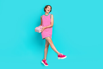 Full body photo of careless young girl dancing boogie woogie bring surprise giftbox happy moment...