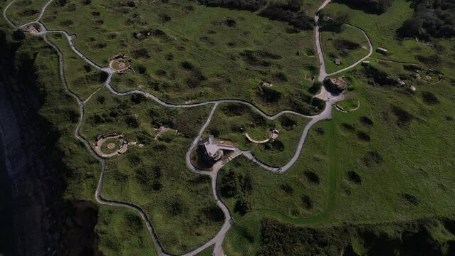 DRONE AERIAL FOOTAGE: The World War II Pointe du Hoc Ranger Monument. Pointe du Hoc is a high point between two of the five D-Day landing beaches, Utah and Omaha in Normandy, France.