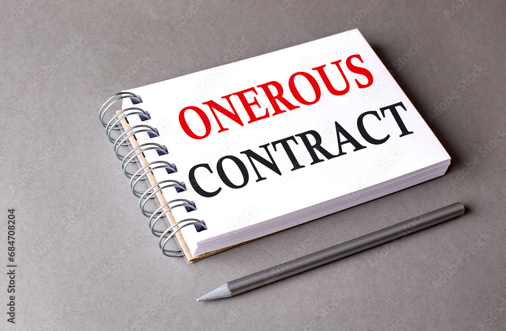 Poster onerous contract word on notebook on grey background