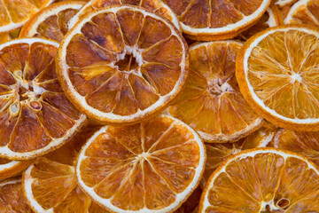 Dried orange slices background. Top view. Close-up.