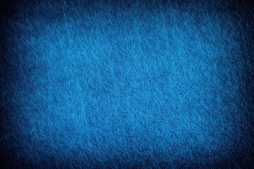 A blue felt background. Close up.