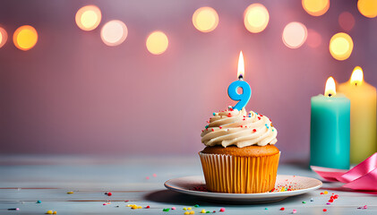Birthday cupcake with lit birthday candle Number nine for nine years or ninth anniversary