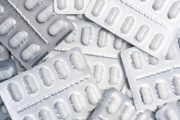 
pack of stacked white pills