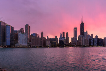 Chicago skyline under colourful cloudy sky at sunset in spring