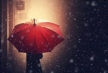 Fotobehang umbrella snow rain storm in the night dark background red umbrella - ai generated © sea and sun
