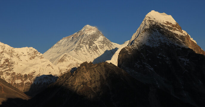 Shadows creeping up at tke top of the world, Mount Everest.