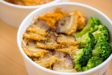 Grill slice of pork meat in the bowl