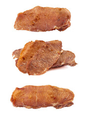 Pieces of cured pork isolated on white background. Portion of dried pork on white background. Dried...