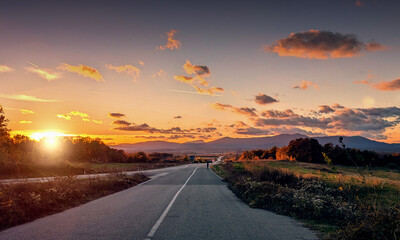 sunset over the road