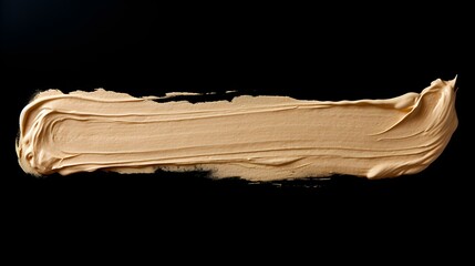 Isolated beige Brush Stroke on a black Background. Acrylic Paint Texture with Copy Space 