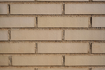 large exposed brick wall texture in brown color