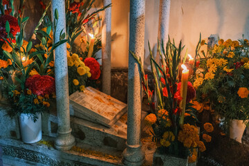 traditional day of death in Oaxaca Mexico with flower on grave cemetery decoration for ceremony 
