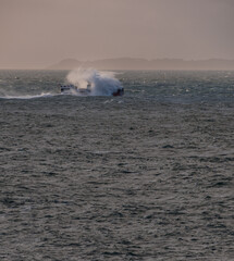 Ferry fighting through heavy seas in Quiberon, Brittany, France