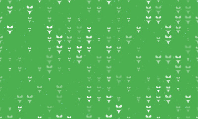 Seamless background pattern of evenly spaced white bikini symbols of different sizes and opacity. Vector illustration on green background with stars