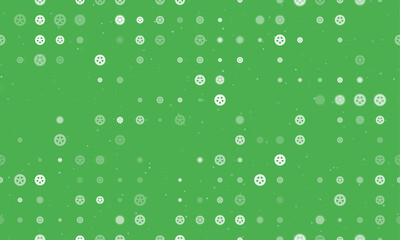 Seamless background pattern of evenly spaced white car wheel symbols of different sizes and opacity. Vector illustration on green background with stars