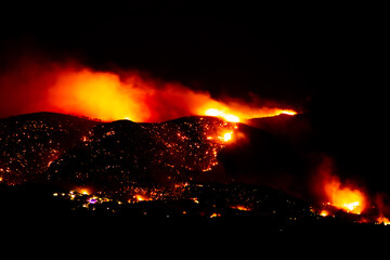 wildfire and smoke at night due to climat change global warming