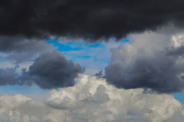 Storm clouds in the sky close-up, among the clouds, before the storm, meteorological service; weather forecasting; meteorological forecast