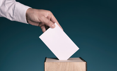 Man putting his vote into ballot box on gradient color background, closeup. Banner design
