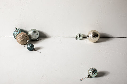 White plaster corner surface with holiday ornaments

