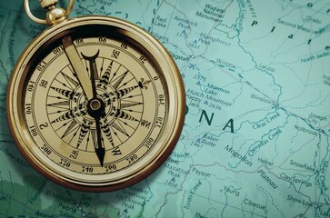 Fototapeta na wymiar Magnetic retro old compass and world map.