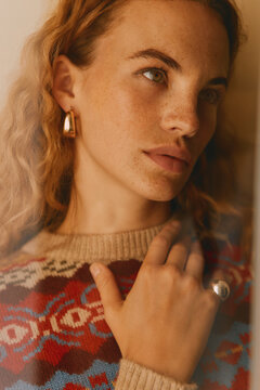 Stylish portraits of beautiful and fashionable girl with curly hair