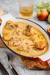 Chicken Normandy served in an enamel-coated cast-iron roaster
