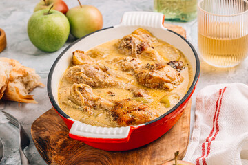 Chicken Normandy served in an enamel-coated cast-iron roaster