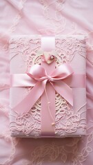 Fototapeta na wymiar A vintage-inspired Valentine's gift box in pastel pink, tied with a satin ribbon, placed on an antique lace tablecloth.