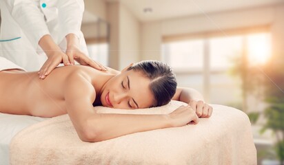 Beautiful young woman getting massage