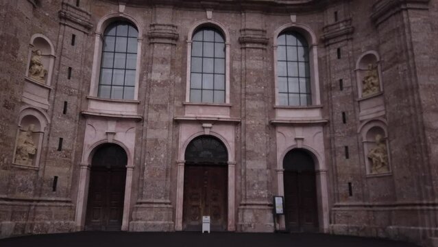 TILT SHOT - St. James Cathedral, or Innsbruck Cathedral, is a Baroque cathedral of the Roman Catholic Diocese of Innsbruck in the city of Innsbruck, Austria. Statues of saints from the Tyrol.