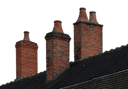 Old brick chimneys on the roof isolated on the blue background