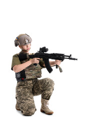 Young female soldier with assault rifle isolated on white