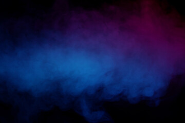 Blue and green steam on a black background.