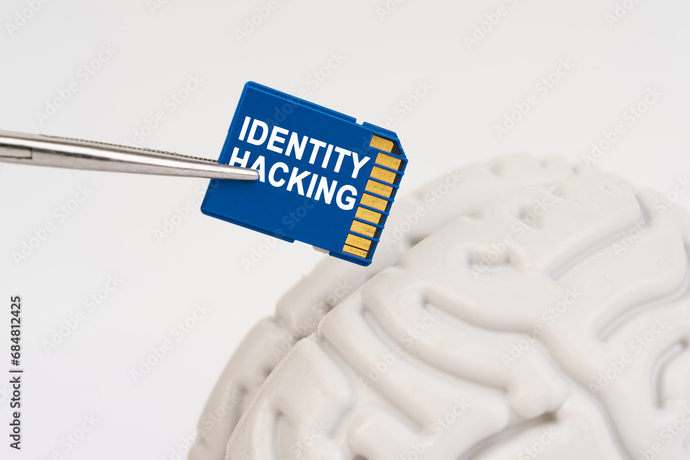 Aufkleber A man inserts a memory card into his brain with the inscription - Identity Hacking
