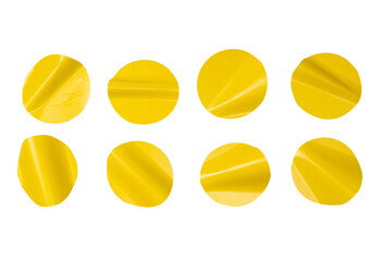 Round yellow stickers, blank tags labels isolated on a white background.