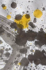Foto op Aluminium Black brown, yellow Ink watercolor spray blot on beige grain texture paper background. © Liliia